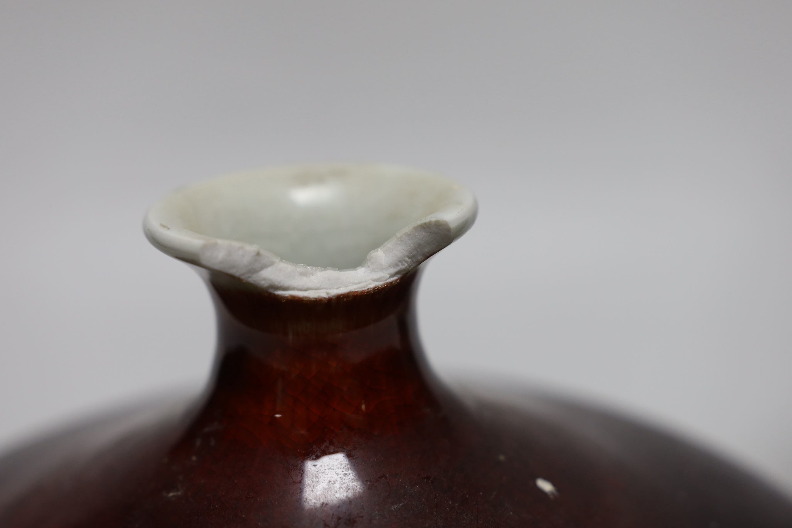 A Chinese sang de boeuf glazed squat vase, a crackle ware vase, a box and cover and a blue and white brush pot, tallest 18.5cm high